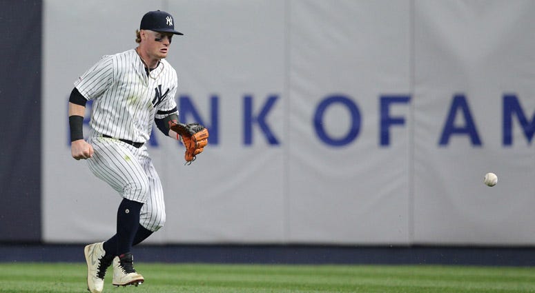 Yankees right fielder Clint Frazier chases a ball hit by the Red Sox's Michael Chavis that went for an RBI triple during the eighth inning at Yankee Stadium. Yankees right fielder Clint Frazier chases a ball hit by the Red Sox's Michael Chavis that went for an RBI triple during the eighth inning at Yankee Stadium.