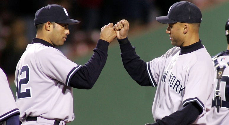 Derek Jeter and Mariano Rivera celebrate a win in Boston on April 13, 2005. Derek Jeter and Mariano Rivera celebrate a win in Boston on April 13, 2005.