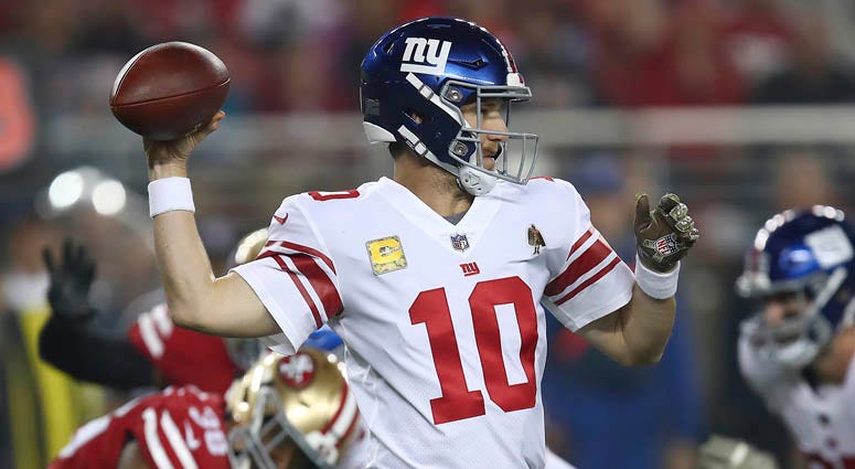 New York Giants quarterback Eli Manning (10) passes against the San Francisco 49ers during the first half of an NFL football game in Santa Clara, Calif., Nov. 12, 2018. New York Giants quarterback Eli Manning (10) passes against the San Francisco 49ers during the first half of an NFL football game in Santa Clara, Calif., Nov. 12, 2018.