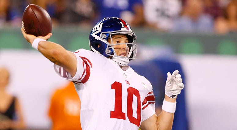 Giants quarterback Eli Manning Giants quarterback Eli Manning