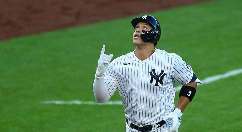Aaron Judge celebrates a homer vs. the Red Sox.
