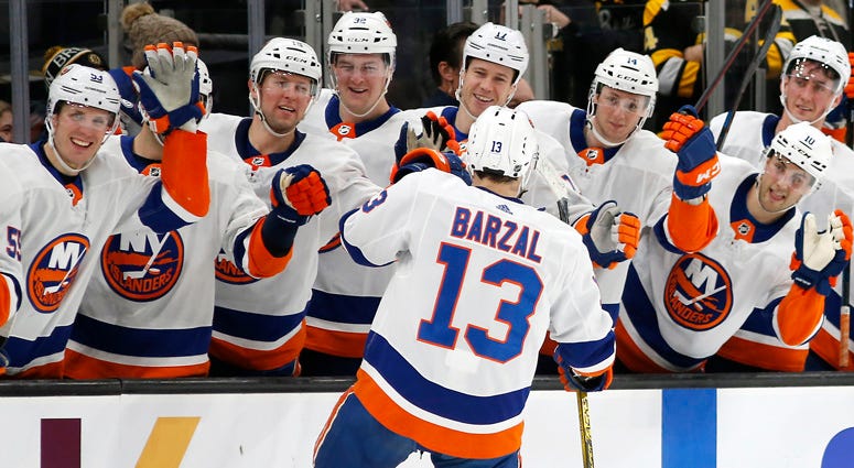 Islanders center Mathew Barzal celebrates with teammates after scoring a goal against the Bruins during a shootout on Dec. 19, 2019, at TD Garden in Boston. Islanders center Mathew Barzal celebrates with teammates after scoring a goal against the Bruins during a shootout on Dec. 19, 2019, at TD Garden in Boston.