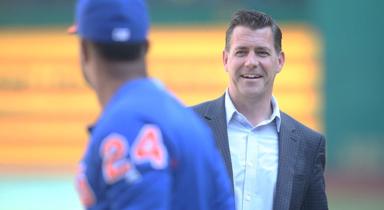 Mets general manager Brodie Van Wagenen (right) talks with second baseman Robinson Cano during batting practice before a game against the PPirates at PNC Park in Pittsburgh on Aug. 3, 2019. 