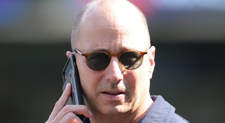 Yankees general manager Brian Cashman speaks on his phone during a workout day before Game 1 of the AL Division Series at Yankees Stadium on Oct. 2, 2019. Yankees general manager Brian Cashman speaks on his phone during a workout day before Game 1 of the AL Division Series at Yankees Stadium on Oct. 2, 2019.