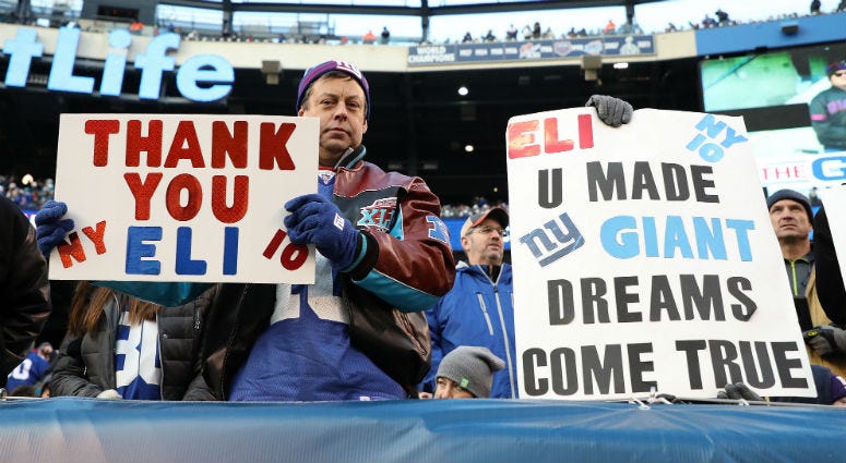 A New York Giants fan holds a sign for Eli Manning #10 of the New York Giants against the Miami Dolphins during their game at MetLife Stadium on December 15, 2019 in East Rutherford, New Jersey. A New York Giants fan holds a sign for Eli Manning #10 of the New York Giants against the Miami Dolphins during their game at MetLife Stadium on December 15, 2019 in East Rutherford, New Jersey.