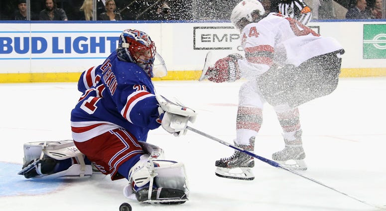 The Rangers' Igor Shesterkin makes a save on Miles Wood of the Devils on Sept. 18, 2019, at Madison Square Garden. The Rangers' Igor Shesterkin makes a save on Miles Wood of the Devils on Sept. 18, 2019, at Madison Square Garden.