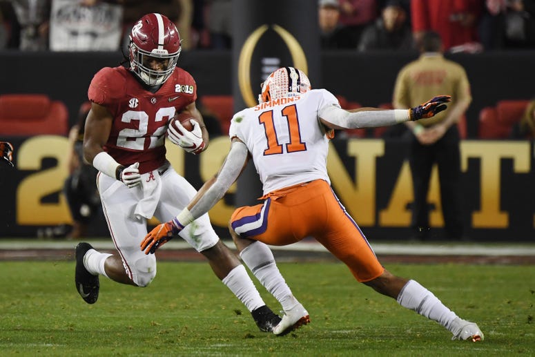 Najee Harris of the Alabama Crimson Tide runs against Isaiah Simmons of the Clemson Tigers in the CFP National Championship presented by AT&T at Levi's Stadium on January 7, 2019 in Santa Clara, California. Najee Harris of the Alabama Crimson Tide runs against Isaiah Simmons of the Clemson Tigers in the CFP National Championship presented by AT&T at Levi's Stadium on January 7, 2019 in Santa Clara, California.