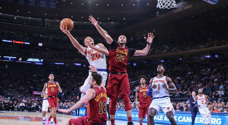 Knicks forward Kevin Knox drives past Cleveland Cavaliers forward Larry Nance Jr. (22) and guard Matthew Dellavedova on Nov. 10, 2019, at Madison Square Garden. Knicks forward Kevin Knox drives past Cleveland Cavaliers forward Larry Nance Jr. (22) and guard Matthew Dellavedova on Nov. 10, 2019, at Madison Square Garden.