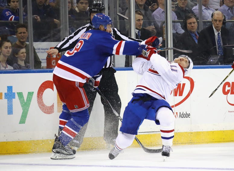 Kevin Klein of the Rangers hits Brendan Gallagher of the Montreal Canadiens during the first period in Game Three of the Eastern Conference First Round during the 2017 NHL Stanley Cup Playoffs at Madison Square Garden on April 16, 2017 in New York City. Kevin Klein of the Rangers hits Brendan Gallagher of the Montreal Canadiens during the first period in Game Three of the Eastern Conference First Round during the 2017 NHL Stanley Cup Playoffs at Madison Square Garden on April 16, 2017 in New York City.