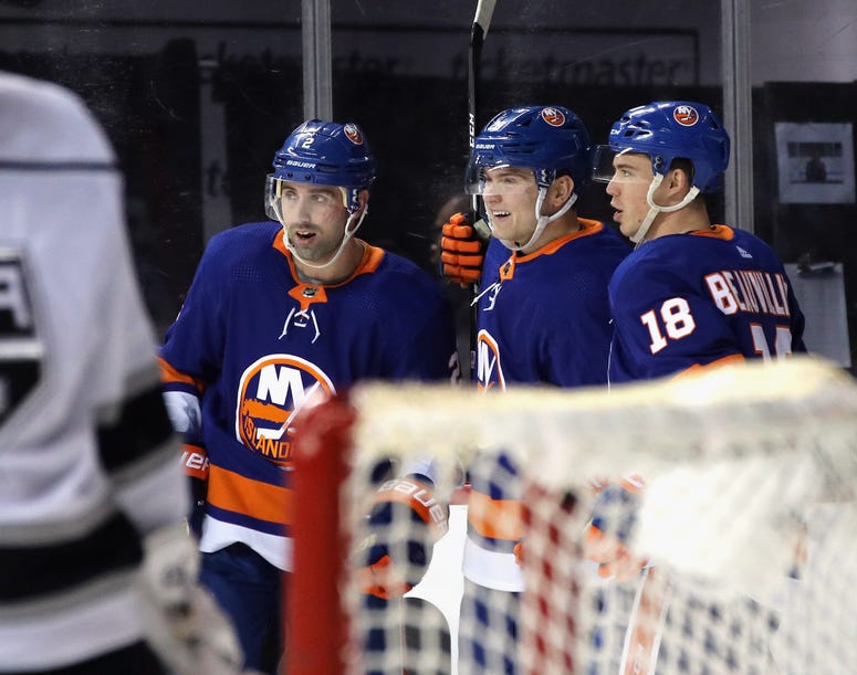 Kieffer Bellows of the Islanders celebrates his first NHL goal against the Los Angeles Kings at 10:22 of the second period and is joined by Nick Leddy and Anthony Beauvillier at the Barclays Center on February 06, 2020. Kieffer Bellows of the Islanders celebrates his first NHL goal against the Los Angeles Kings at 10:22 of the second period and is joined by Nick Leddy and Anthony Beauvillier at the Barclays Center on February 06, 2020.