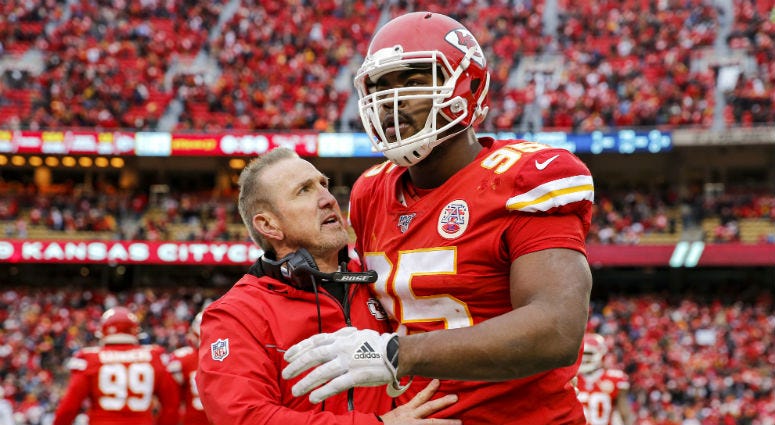 Kansas City Chiefs defensive coordinator Steve Spagnuolo congratulates Chris Jones #95 of the Kansas City Chiefs after a fourth quarter sack against the Los Angeles Chargers at Arrowhead Stadium on December 29, 2019 in Kansas City, Missouri Kansas City Chiefs defensive coordinator Steve Spagnuolo congratulates Chris Jones #95 of the Kansas City Chiefs after a fourth quarter sack against the Los Angeles Chargers at Arrowhead Stadium on December 29, 2019 in Kansas City, Missouri
