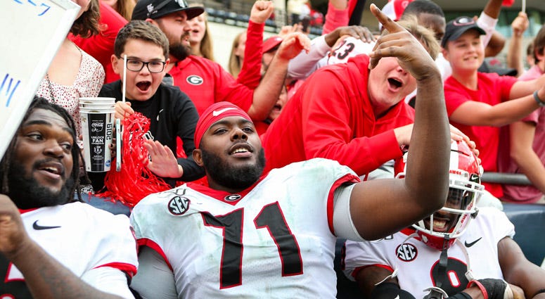 Georgia's Andrew Thomas celebrates after a win over Georgia Tech on Nov. 30, 2019, at Bobby Dodd Stadium in Atlanta. Georgia's Andrew Thomas celebrates after a win over Georgia Tech on Nov. 30, 2019, at Bobby Dodd Stadium in Atlanta.