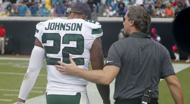 Oct 27, 2019; Jacksonville, FL, USA; An assistant takes New York Jets cornerback Trumaine Johnson (22) to the locker room during the second quarter against the Jacksonville Jaguars at TIAA Bank Field. Oct 27, 2019; Jacksonville, FL, USA; An assistant takes New York Jets cornerback Trumaine Johnson (22) to the locker room during the second quarter against the Jacksonville Jaguars at TIAA Bank Field.