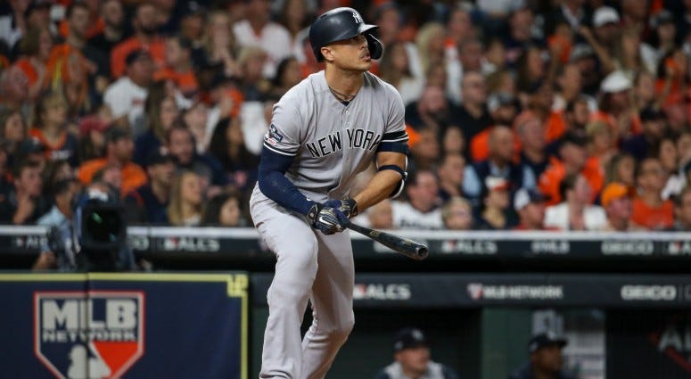 New York Yankees left fielder Giancarlo Stanton (27) hits a solo home run against the Houston Astros in the sixth inning in game one of the 2019 ALCS playoff baseball series on Oct 12, 2019 at Minute Maid Park.