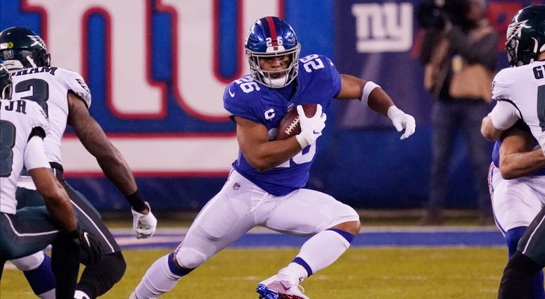 Giants running back Saquon Barkley runs the ball against the Philadelphia Eagles Dec 29, 2019; East Rutherford, New Jersey Giants running back Saquon Barkley runs the ball against the Philadelphia Eagles Dec 29, 2019; East Rutherford, New Jersey