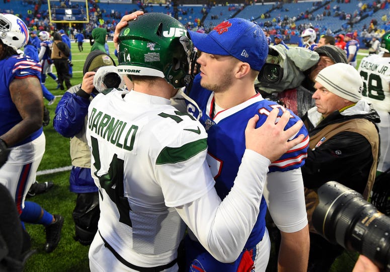 New York Jets quarterback Sam Darnold (14) and Buffalo Bills quarterback Josh Allen (17) meet following the game on Dec 29, 2019 at New Era Field. New York Jets quarterback Sam Darnold (14) and Buffalo Bills quarterback Josh Allen (17) meet following the game on Dec 29, 2019 at New Era Field.