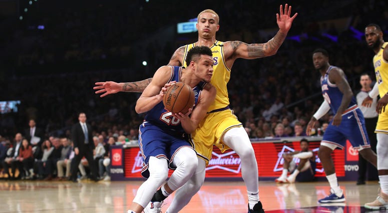 The Lakers' Kyle Kuzma defends against the Knicks' Kevin Knox on Jan. 7, 2020, at the Staples Center in Los Angeles. The Lakers' Kyle Kuzma defends against the Knicks' Kevin Knox on Jan. 7, 2020, at the Staples Center in Los Angeles.