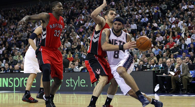 The Nets' Deron Williams runs past the Raptors defense at the O2 Arena in London on March 4, 2011. The Nets' Deron Williams runs past the Raptors defense at the O2 Arena in London on March 4, 2011.