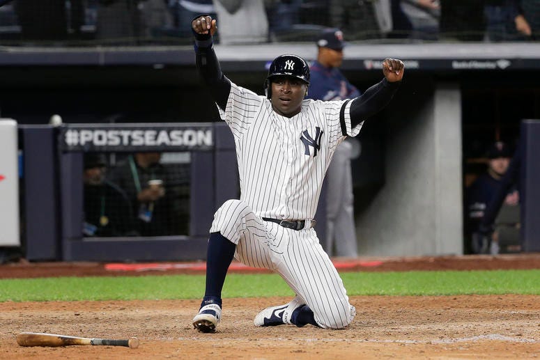 New York Yankees' Didi Gregorius reacts after scoring on a double by second baseman DJ LeMahieu (26) during the seventh inning of Game 1 of an American League Division Series baseball game against the Minnesota Twins, Friday, Oct. 4, 2019, in New York New York Yankees' Didi Gregorius reacts after scoring on a double by second baseman DJ LeMahieu (26) during the seventh inning of Game 1 of an American League Division Series baseball game against the Minnesota Twins, Friday, Oct. 4, 2019, in New York