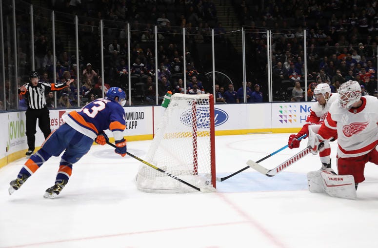 Madison Bowey of the Detroit Red Wings stops a shot by Mathew Barzal of the Islanders on the goal line during the second period at NYCB Live's Nassau Coliseum on January 14, 2020 in Uniondale, New York. Madison Bowey of the Detroit Red Wings stops a shot by Mathew Barzal of the Islanders on the goal line during the second period at NYCB Live's Nassau Coliseum on January 14, 2020 in Uniondale, New York.