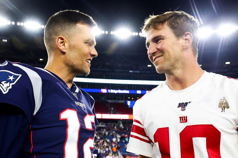 Eli Manning and Tom Brady Eli Manning and Tom Brady