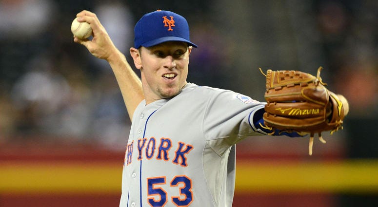 Jeremy Hefner pitches for the Mets in August 2013. Jeremy Hefner pitches for the Mets in August 2013.