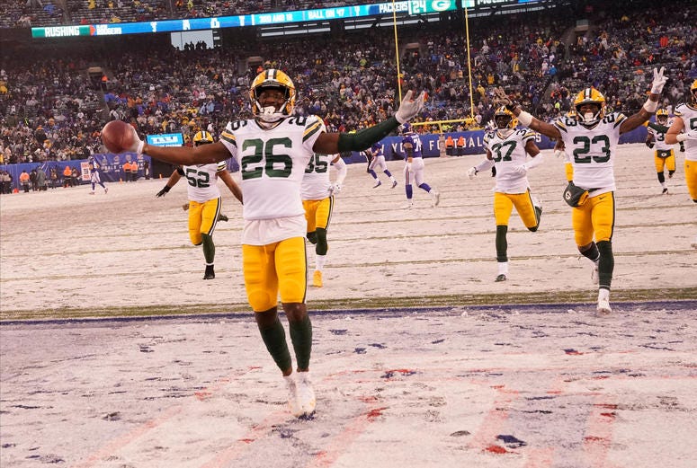 The Packers celebrate against the Giants. The Packers celebrate against the Giants.