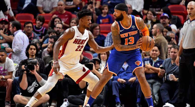 Knicks forward Marcus Morris defended by Miami Heat forward Jimmy Butler Dec 20, 2019; Miami, Florida Knicks forward Marcus Morris defended by Miami Heat forward Jimmy Butler Dec 20, 2019; Miami, Florida
