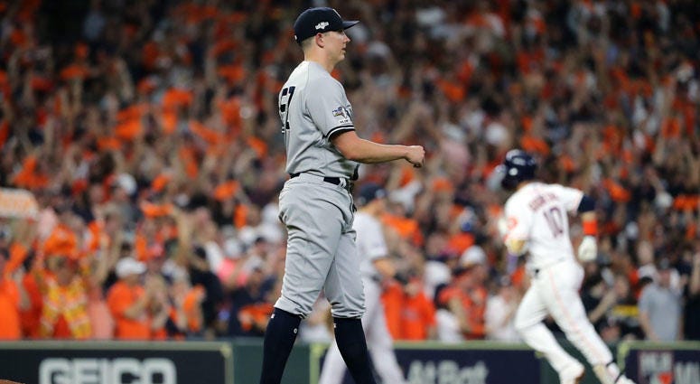 The Yankees' Chad Green reacts as Yuli Gurriel of the Houston Astros rounds the bases after hitting a three-run home run in Game 6 of the American League Championship Series on Oct. 19, 2019 in Houston. The Yankees' Chad Green reacts as Yuli Gurriel of the Houston Astros rounds the bases after hitting a three-run home run in Game 6 of the American League Championship Series on Oct. 19, 2019 in Houston.