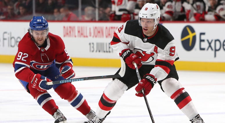 The Devils' Taylor Hall plays the puck against the Canadiens' Jonathan Drouin on April 1, 2018, at the Bell Centre in Montreal. The Devils' Taylor Hall plays the puck against the Canadiens' Jonathan Drouin on April 1, 2018, at the Bell Centre in Montreal.