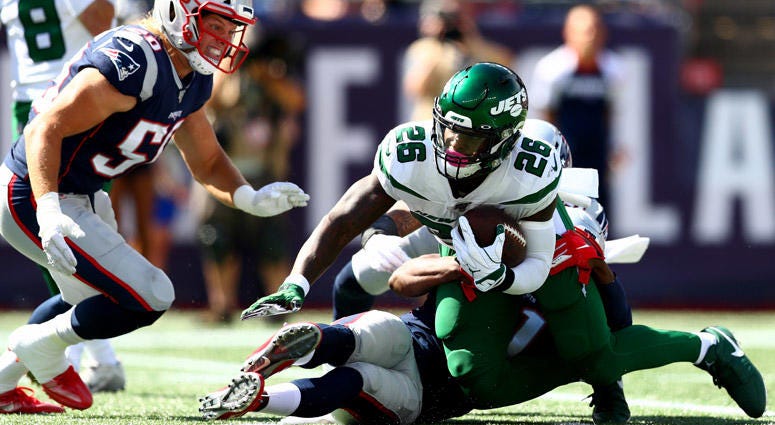 The Jets' Le'Veon Bell is tackled by the New England Patriots on Sept. 22, 2019, at Gillette Stadium in Foxborough, Massachusetts. The Jets' Le'Veon Bell is tackled by the New England Patriots on Sept. 22, 2019, at Gillette Stadium in Foxborough, Massachusetts.