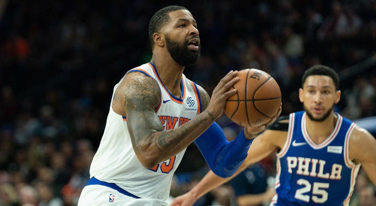 Knicks forward Marcus Morris shoots in front of 76ers guard Ben Simmons on Nov. 20, 2019, at Wells Fargo Center. Knicks forward Marcus Morris shoots in front of 76ers guard Ben Simmons on Nov. 20, 2019, at Wells Fargo Center.