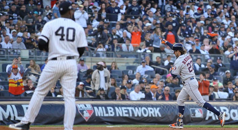 Astros right fielder Josh Reddick rounds the bases after hitting a solo home run as Yankees pitcher Luis Severino looks on during Game 3 of the ALCS on Oct. 15, 2019, at Yankee Stadium. Astros right fielder Josh Reddick rounds the bases after hitting a solo home run as Yankees pitcher Luis Severino looks on during Game 3 of the ALCS on Oct. 15, 2019, at Yankee Stadium.