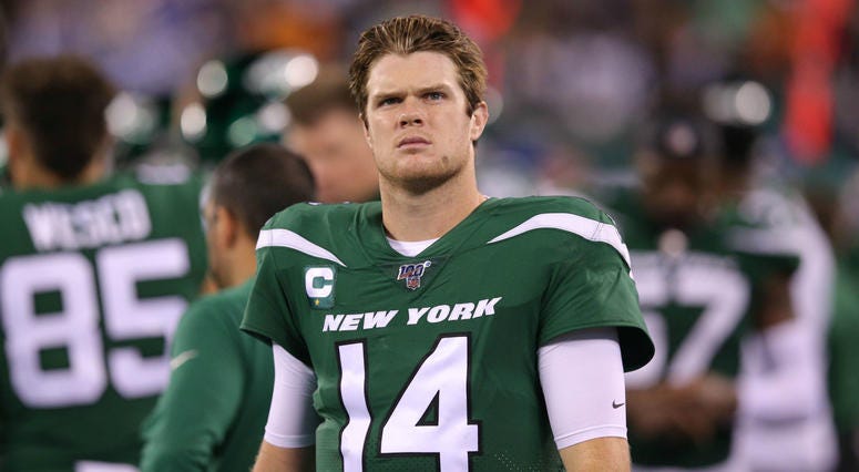 Oct 21, 2019; East Rutherford, NJ, USA; New York Jets quarterback Sam Darnold (14) reacts on the sideline during the fourth quarter against the New England Patriots at MetLife Stadium. Oct 21, 2019; East Rutherford, NJ, USA; New York Jets quarterback Sam Darnold (14) reacts on the sideline during the fourth quarter against the New England Patriots at MetLife Stadium.