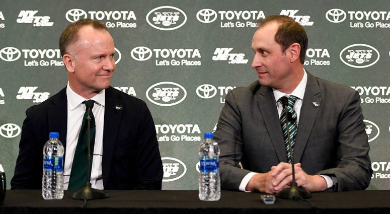 Jets Chairman and CEO Christopher Johnson (left) and coach Adam Gase Jets Chairman and CEO Christopher Johnson (left) and coach Adam Gase