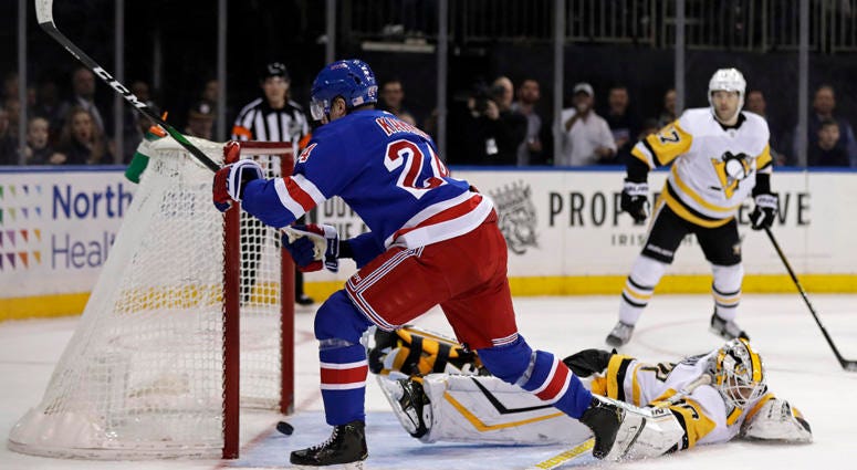 Rangers right wing Kaapo Kakko scores the game-winning goal past Penguins goaltender Matt Murray during overtime on Nov. 12, 2019, at Madison Square Garden. Rangers right wing Kaapo Kakko scores the game-winning goal past Penguins goaltender Matt Murray during overtime on Nov. 12, 2019, at Madison Square Garden.