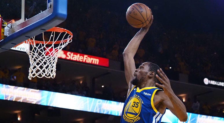 Warriors forward Kevin Durant dunks the ball against the Los Angeles Clippers during Game 5 of their first-round playoff series on April 24, 2019, at Oracle Arena in Oakland, California. Warriors forward Kevin Durant dunks the ball against the Los Angeles Clippers during Game 5 of their first-round playoff series on April 24, 2019, at Oracle Arena in Oakland, California.