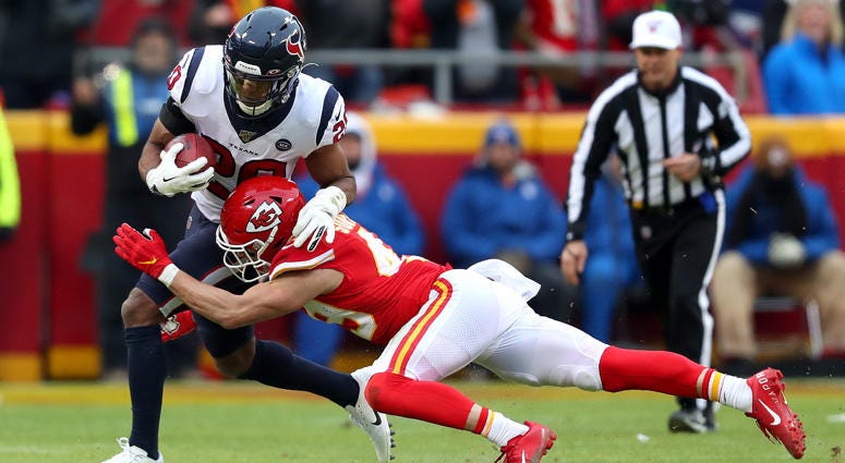 The Texans' Justin Reid is tackled by the Chiefs' Daniel Sorensen on a fake punt during the second quarter in their AFC divisional playoff game on Jan. 12, 2020, at Arrowhead Stadium in Kansas City, Missouri. The Texans' Justin Reid is tackled by the Chiefs' Daniel Sorensen on a fake punt during the second quarter in their AFC divisional playoff game on Jan. 12, 2020, at Arrowhead Stadium in Kansas City, Missouri.