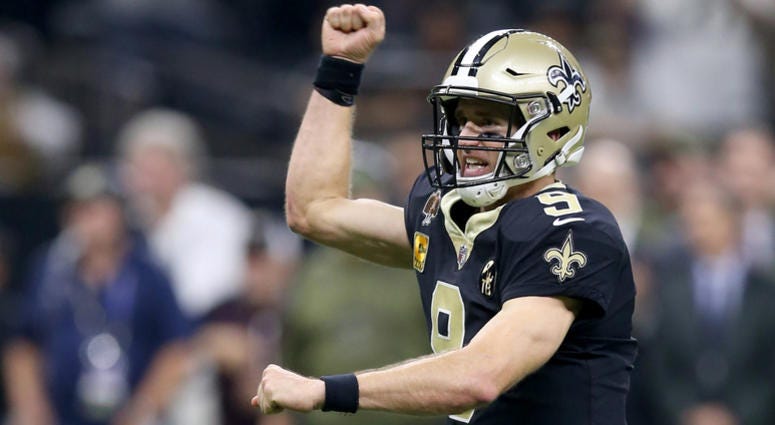 Nov 4, 2018; New Orleans, LA, USA; New Orleans Saints quarterback Drew Brees (9) gestures after a touchdown in the second quarter against the Los Angeles Rams at the Mercedes-Benz Superdome. Mandatory Credit: Chuck Cook-USA TODAY Sports Nov 4, 2018; New Orleans, LA, USA; New Orleans Saints quarterback Drew Brees (9) gestures after a touchdown in the second quarter against the Los Angeles Rams at the Mercedes-Benz Superdome. Mandatory Credit: Chuck Cook-USA TODAY Sports