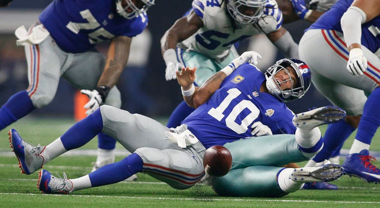 Cowboys linebacker Damien Wilson causes a fumble on a sack of Giants quarterback Eli Manning on Sept. 16, 2018, at AT&T Stadium. Cowboys linebacker Damien Wilson causes a fumble on a sack of Giants quarterback Eli Manning on Sept. 16, 2018, at AT&T Stadium.