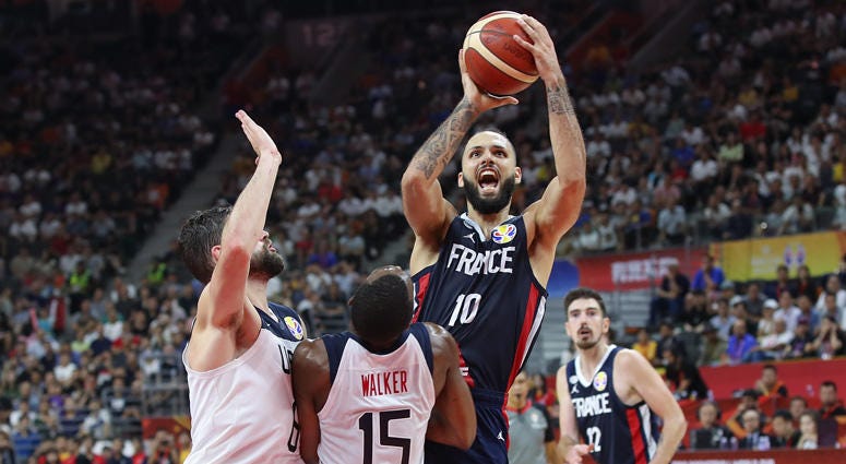 France's Evan Fournier shoots against USA's Joe Harris in the FIBA World Cup quarterfinals on Sept. 11, 2019, at Dongguan Basketball Center in Dongguan, China. France's Evan Fournier shoots against USA's Joe Harris in the FIBA World Cup quarterfinals on Sept. 11, 2019, at Dongguan Basketball Center in Dongguan, China.