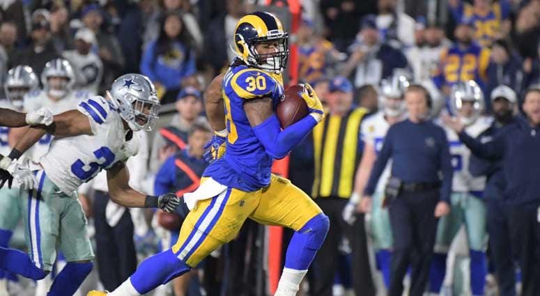 The Rams' Todd Gurley runs the ball against the Dallas Cowboys on Jan. 12, 2019, in an NFC divisional playoff football game at Los Angeles Memorial Coliseum. The Rams' Todd Gurley runs the ball against the Dallas Cowboys on Jan. 12, 2019, in an NFC divisional playoff football game at Los Angeles Memorial Coliseum.