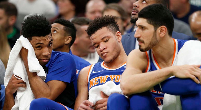 Dec 6, 2018; Boston, MA, USA; Knicks guard Allonzo Trier (14), forward Kevin Knox (20) and center Enes Kanter (0) react on the bench late in the second half against the Boston Celtics at TD Garden. Mandatory Credit: Greg M. Cooper-USA TODAY Sports Dec 6, 2018; Boston, MA, USA; Knicks guard Allonzo Trier (14), forward Kevin Knox (20) and center Enes Kanter (0) react on the bench late in the second half against the Boston Celtics at TD Garden. Mandatory Credit: Greg M. Cooper-USA TODAY Sports