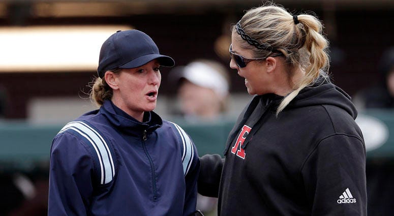 Rutgers head coach Kristen Butler, right, argues a call with the home plate umpire during a game in February. Rutgers head coach Kristen Butler, right, argues a call with the home plate umpire during a game in February.