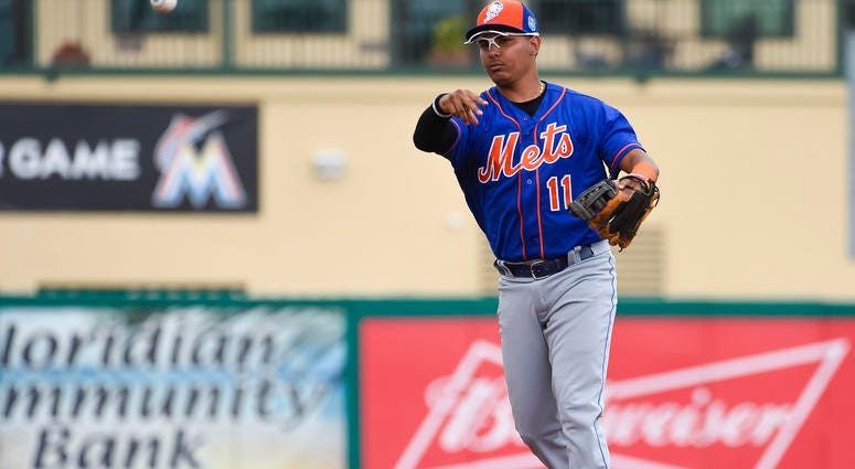 Mar 13, 2016; Jupiter, FL, USA; New York Mets shortstop Ruben Tejada (11) throws out a Miami Marlins base runner at Roger Dean Stadium. Mandatory Credit: Scott Rovak-USA TODAY Sports Mar 13, 2016; Jupiter, FL, USA; New York Mets shortstop Ruben Tejada (11) throws out a Miami Marlins base runner at Roger Dean Stadium. Mandatory Credit: Scott Rovak-USA TODAY Sports