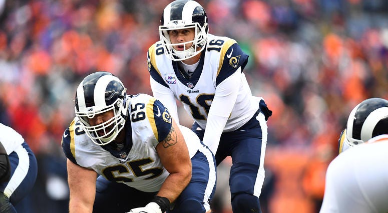 Oct 14, 2018; Denver, CO, USA; Los Angeles Rams quarterback Jared Goff (16) calls for the snap from center John Sullivan (65) in the second half against the Denver Broncos at Broncos Stadium at Mile High. Mandatory Credit: Ron Chenoy-USA TODAY Sports Oct 14, 2018; Denver, CO, USA; Los Angeles Rams quarterback Jared Goff (16) calls for the snap from center John Sullivan (65) in the second half against the Denver Broncos at Broncos Stadium at Mile High. Mandatory Credit: Ron Chenoy-USA TODAY Sports