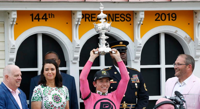 Tyler Gaffalione holds the Woodlawn Vase after winning the 144th running of the Preakness Stakes aboard War of Will at Pimlico Race Course. Tyler Gaffalione holds the Woodlawn Vase after winning the 144th running of the Preakness Stakes aboard War of Will at Pimlico Race Course.