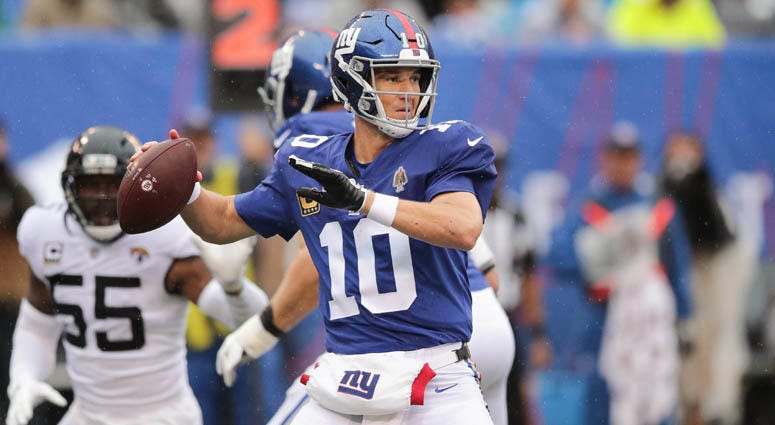 Giants quarterback Eli Manning passes the ball in front of Jacksonville Jaguars defensive end Lerentee McCray on Sept. 9, 2018, at MetLife Stadium. Giants quarterback Eli Manning passes the ball in front of Jacksonville Jaguars defensive end Lerentee McCray on Sept. 9, 2018, at MetLife Stadium.