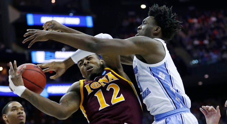 North Carolina Tar Heels forward Nassir Little (5) knocks the ball away from Iona Gaels forward Tajuan Agee (12) in the first half in the first round of the NCAA Tournament on March 22, 2019, in Columbus, Ohio. North Carolina Tar Heels forward Nassir Little (5) knocks the ball away from Iona Gaels forward Tajuan Agee (12) in the first half in the first round of the NCAA Tournament on March 22, 2019, in Columbus, Ohio.