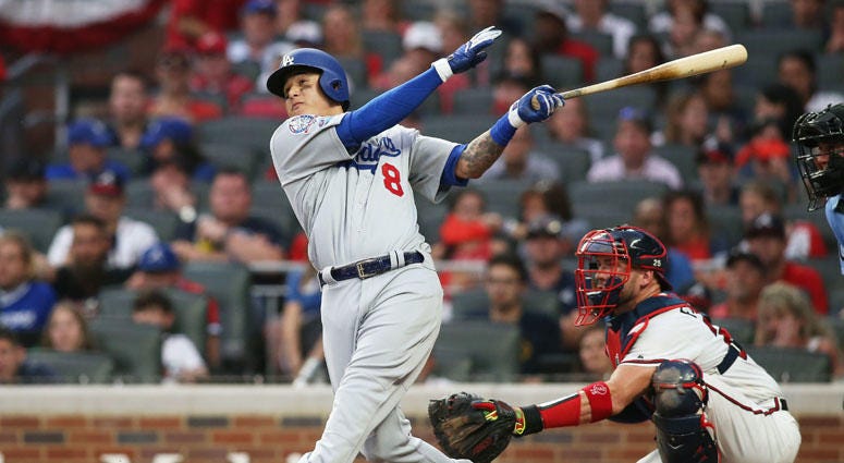 Dodgers shortstop Manny Machado hits a three-run home run in the seventh inning in Game 4 of the National League Division Series at SunTrust Park in Atlanta. Dodgers shortstop Manny Machado hits a three-run home run in the seventh inning in Game 4 of the National League Division Series at SunTrust Park in Atlanta.
